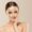 Woman face beauty hand touching face healthy natural makeup female beige background