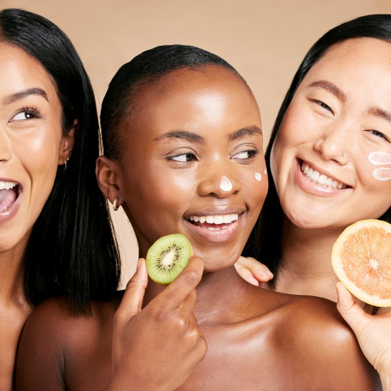 Face, fruits and women in portrait with cream for facial care, beauty and natural cosmetics isolate