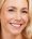 Portrait, skincare and happy with a woman in studio on a gray background for beauty or antiaging tr