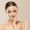 Woman face beauty hand touching face healthy natural makeup female beige background