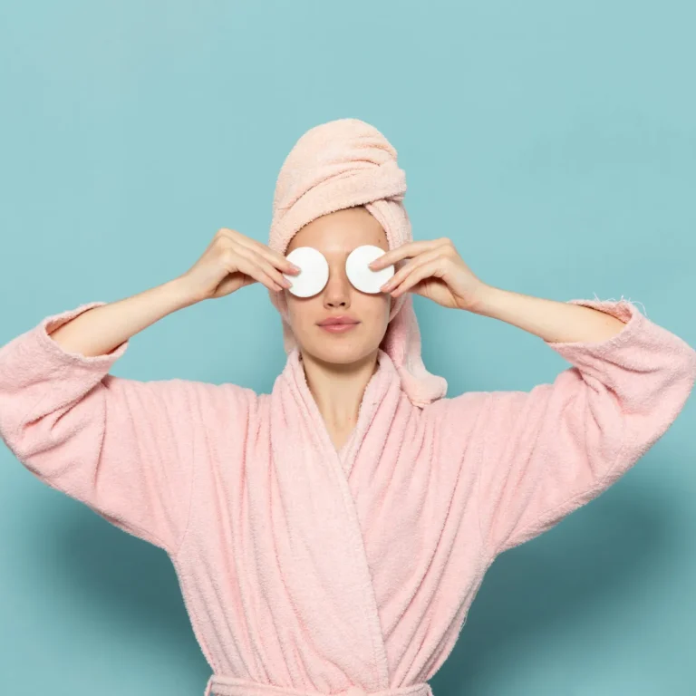 young-female-pink-bathrobe-after-shower-covering-her-eyes-blue-scaled